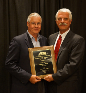 Don Mauldin of LDA Engineering and Phil Pindzola of Johnson City Public Works Department accept the Tennessee Chapter of American Public Works Association Tennessee Project of the Year award for Founders Park in Johnson City. The project will be entered in the APWA national competition in the fall of 2015.